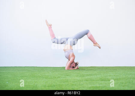 Perfect yoga pilates workout position for strong young caucasian lady - millennial people living with perfect healthy lifestyle with no more weight -  Stock Photo