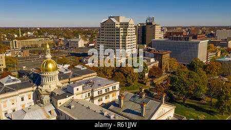 The state capital dome reflects sunlight late afternoon in downtown Trenton New Jersey Stock Photo