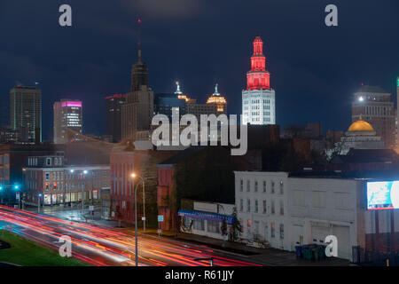 The buildings are illuminated before sunrise in the urban core of Buffalo New York Stock Photo