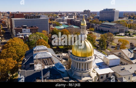 The state capital dome reflects sunlight late afternoon in downtown Trenton New Jersey Stock Photo