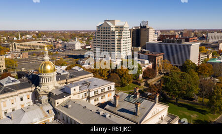 The state capital dome reflects sunlight late afternoon in downtown Trenton New Jersey Stock Photo