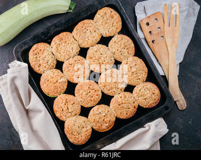 Baking tray with vegetables muffins with zucchini Stock Photo