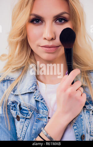 Beauty Woman With Makeup Brushes Natural Make Up For Blonde Model