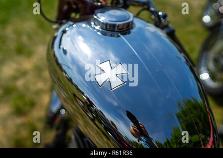 The image of the German Iron Cross on the fuel tank of a motorcycle. Stock Photo