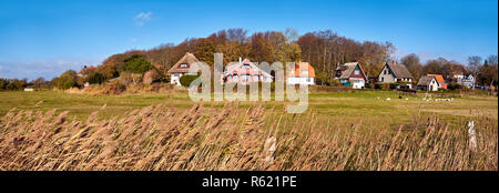 Panoramic image with traditional houses in Kloster, village on the North of Hiddensee, a car-free island in the Baltic sea North of Germany Stock Photo