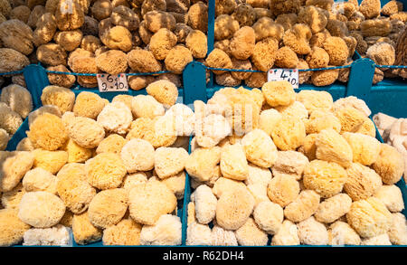 View of a street market stand of natural marine sea sponges collected by the fishermen in the sea. Stock Photo