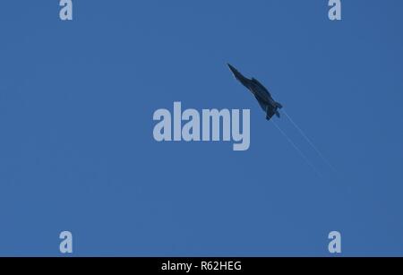 An F-15E Strike Eagle assigned to the 4th Fighter Wing performs an aerial maneuver as part of a training mission at Dare County Bomb Range Nov. 16, 2018, in Stumpy Point, North Carolina. The range encompasses approximately 46,000 acres of land used for pilots to train and sharpen their skills in providing air support. Stock Photo