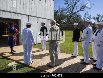 Sailors assigned to the Ohio-class guided-missile submarine USS Florida (SSGN 728) attend a tour of Mission San Luis during a namesake visit to the city of Tallahassee. Navy events such as the Florida namesake visit are interactive ways to share what the Navy does for our country with a number of different communities. Florida is one of four guided-missile submarines in the U.S Navy fleet and one of two SSGNs stationed at Naval Submarine Base Kings Bay, Georgia. Stock Photo