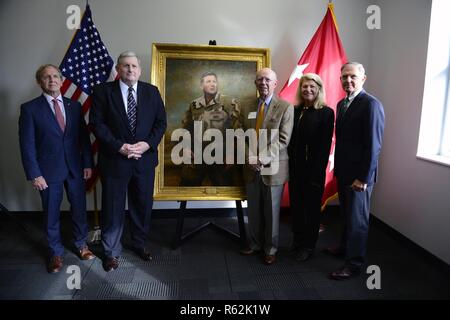 (From left to right) Retired Navy Adm. Eric T. Olson, former USSOCOM commander; retired Army Gen. Peter J. Schoomaker, former USSOCOM commander and Army chief of staff; Tom Arthur, University of Tampa benefactor; retired Army Gen. Ann Dunwoody, the Army’s first female four-star general; and retired Army Gen. Bryan “Doug” Brown, also a former USSOCOM commander, pose with Schoomaker’s painting at the University of Tampa in Tampa, Fla., Nov. 19, 2018. Stock Photo