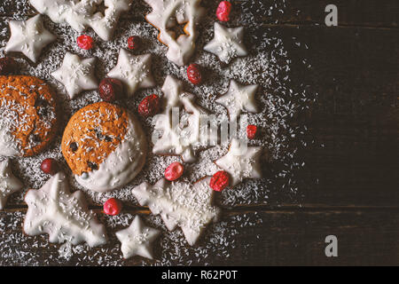 Christmas ball made by  cookies and berries on the wooden background  top view Stock Photo