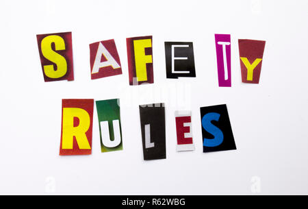 A word writing text showing concept of Safety Rules made of different magazine newspaper letter for Business case on the white background with copy space Stock Photo