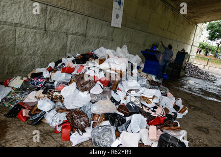 SÃO PAULO, SP - 03.12.2018: PREFEITURA DESTR'I PRODUTOS PIRATAS - The mayor Bruno Covas, creates on Monday (03), a Municipal Commission to Combat the Illegal Market, to curb irregular trade in the city of São Paulo. Only in November of this year, there were 17 thousand seizures, which will be incinerated and crushed. (Photo: Aloisio Mauricio/Fotoarena) Stock Photo