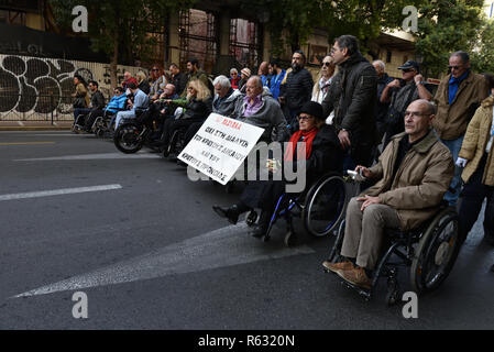 Athens, Greece. 3rd Dec 2018. Disabled persons rally to mark the International Day of Persons with Disabilities in Athens, Greece. Credit: Nicolas Koutsokostas/Alamy Live News. Stock Photo