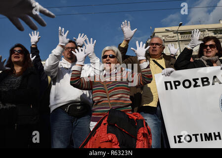 Athens, Greece. 3rd Dec 2018. Disabled persons rally to mark the International Day of Persons with Disabilities in Athens, Greece. Credit: Nicolas Koutsokostas/Alamy Live News. Stock Photo