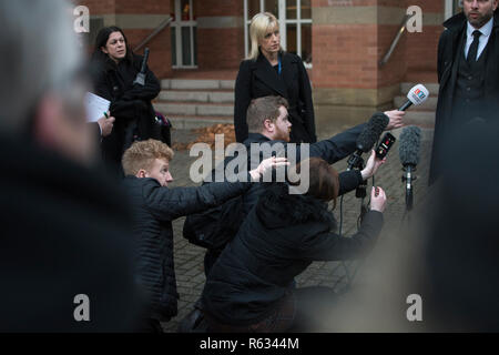 Stafford, UK. 3 December 2018. Gemma Eastwood, the sister of murdered midwife Samantha Eastwood, and Detective Inspector Dan Ison speak to media outside Stafford Crown Court. Michael Stirling was sentenced to life in prison for the murder last July. Credit: Benjamin Wareing/ Alamy Live News Stock Photo