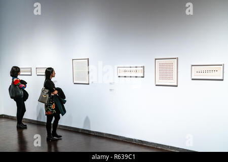 New York, USA. 3rd Dec 2018. People visit the exhibition 'Julio Le Parc 1959' during a preview in New York City's Met Breuer museum. The first solo exhibition in New York by the Argentine-born artist  opens on 4 December 2018 and runs until 24 February 2019. Photo by Enrique Shore Credit: Enrique Shore/Alamy Live News Stock Photo