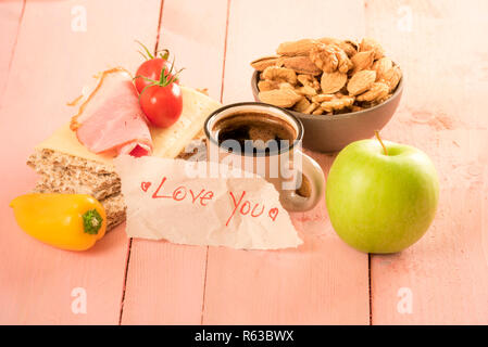 Love you message wrote on paper Stock Photo