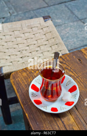Caj, tea in a traditional tulip glass, Beyoglu, Istanbul, Turkey, Eurasia Stock Photo