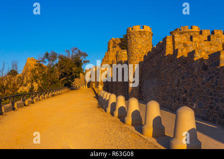 Empty heritage unusual famous place Castillitos Battery, ancient landmark on coast of Mediterranean Sea, fortification, fortified wall of Cartagena city, Murcia. Idyllic scenery and mountains. Spain Stock Photo