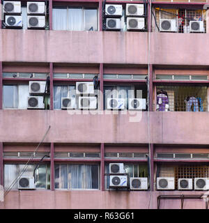 Facade of a building with many air conditioners, Kuala Lumpur, Malaysia Stock Photo
