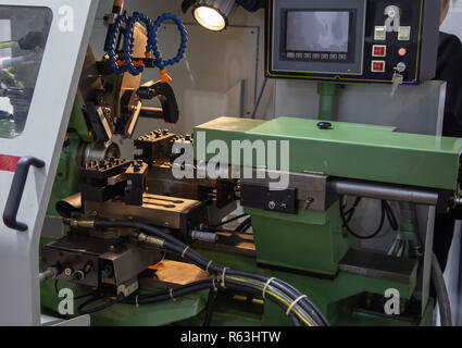 CNC hydraulic lathe machine drilling bore workpiece Stock Photo