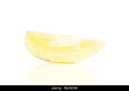 One slice of fresh striped pepino melon isolated on white background Stock Photo