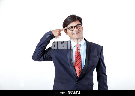 Young Indian businessman over white background Stock Photo