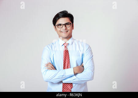 Young Indian businessman over white background Stock Photo