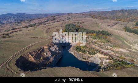 The emerald lake in Racos, Romania Stock Photo