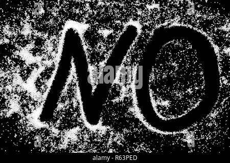 No word symbol drawing by finger on white snow salt powder on black background. Capital letters Stock Photo