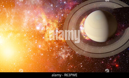 Saturn and his ring system. Elements of this image furnished by NASA. Stock Photo