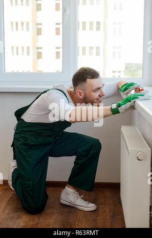 Foreman using a level tool Stock Photo