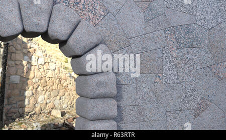 Upper right part of a cyclopean stone gate with granite tiled wall, debris viewed through the opening. 3d render. Stock Photo