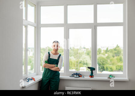 Handsome man and his equipment Stock Photo