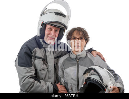 couple senior riders with helmet isolated on the white background Stock Photo