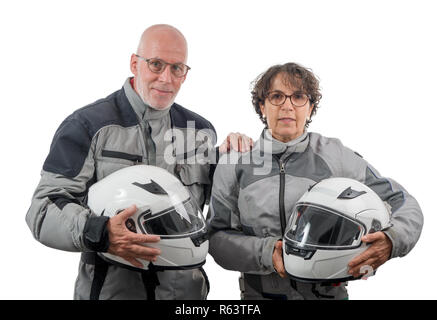 couple senior riders with helmet isolated on the white background Stock Photo