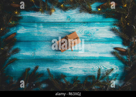 Christmas present on a blue wodden table Stock Photo