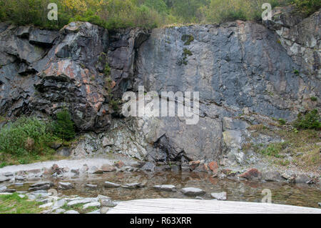 stepping stones placed in a pond. Photographed on the 'Wild Water Way' Stubai, Tyrol, Austria Stock Photo
