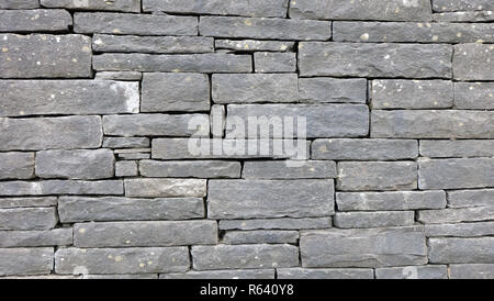 Horizontal texture of grey slate wall tiles Stock Photo