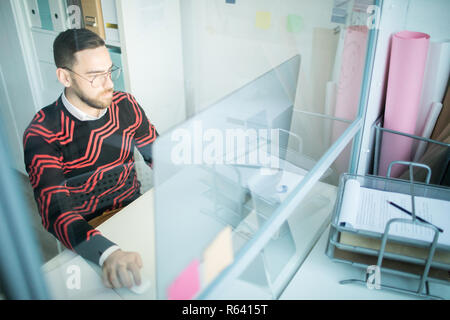 Modern analyst using desktop computer Stock Photo