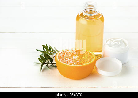 Spa concept with salt, mint, lotion, towel on white background Stock Photo