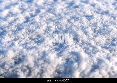 Fresh white powder snow background from outdoors on winter day Stock Photo