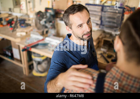 Two Colleagues in Workshop Stock Photo