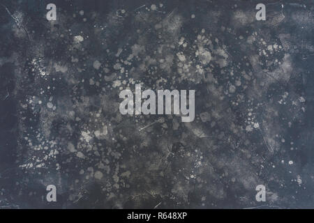 Black texture can be used for background. Dark texture with a pattern. Black and gray spots. Top wiev. Stock Photo