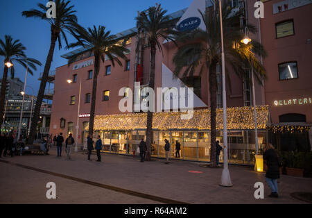 GENOA (GENOVA), ITALY, NOVEMBER 27, 2018 - Eataly with Christmas illuminations in Genoa 'Porto Antico' area at dusk, Italy Stock Photo