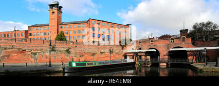 The Grocers Warehouse Ruins and Bridgewater Canal, Castlefield, Manchester, Lancashire, England, UK Stock Photo