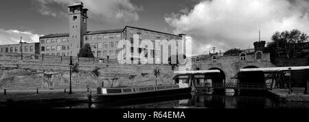 The Grocers Warehouse Ruins and Bridgewater Canal, Castlefield, Manchester, Lancashire, England, UK Stock Photo