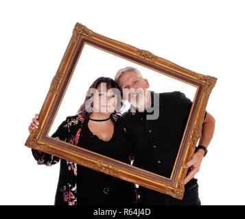 Happy couple in a picture frame Stock Photo