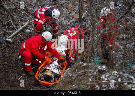 Sofia, Bulgaria - 5 December 2017: Paramedics from mountain rescue service provide first aid during a training for saving a person in accident in the  Stock Photo