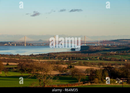 Three bridges, the Queensferry Crossing, Forth Road bridge, and Forth Rail Bridge spanning the Firth of Forth between North and South Queensferry. Stock Photo